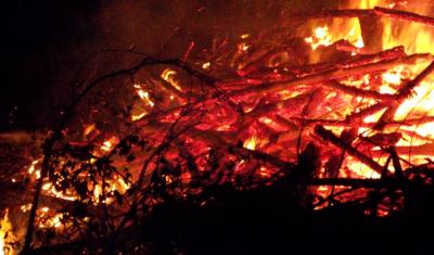 brush pile fire at night